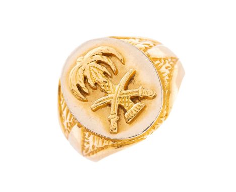 An 18ct gold signet ring, the central oval panel with the National Emblem of Saudi Arabia, stamped 18, ring size R, 13.9gCond