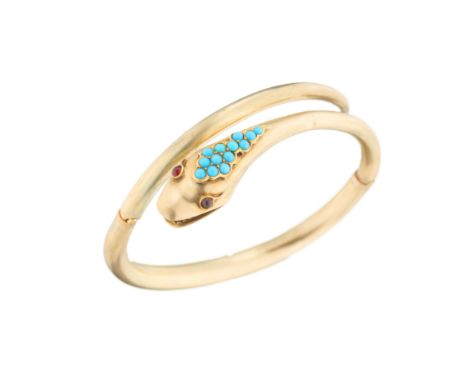 A late Victorian gold snake hinged bangle, with turquoise cabochon crest and garnet cabochon eyes, inner diameter 5.4cm, 13.5