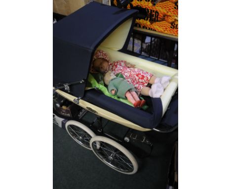 Silver Cross Millennium Pedigree dolls pram with two vintage dolls, one with crying mechanism    