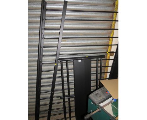 A BLACK METAL DOUBLE BED FRAME - NOT CHECKED
