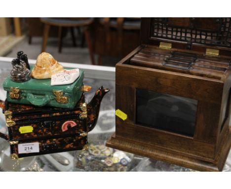 A NOVELTY CERAMIC TEAPOT TOGETHER WITH A NOVELTY PHOTOGRAPH ALBUM BOX (2)