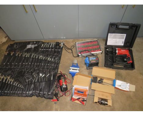A MAKITA M8101 DRILL, A 48PC COMBINATION SPANNER SET, A 35PC ROUTER SET, IRWIN RECORD BENCH VICE, BENCH SHARPENER, BATTERY CH