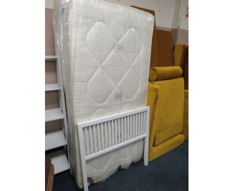A MODERN METAL SINGLE BED FRAME WITH MATTRESS