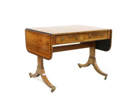 A Regency-style rosewood and satinwood crossbanded sofa table by Edwards &amp; Roberts, early 20th century, the rectangular t