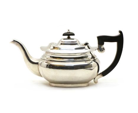 A silver teapot, by E Viner, Sheffield 1930, of plain oblong bellied form with a wooden handle and finial, engraved 'C', 31cm