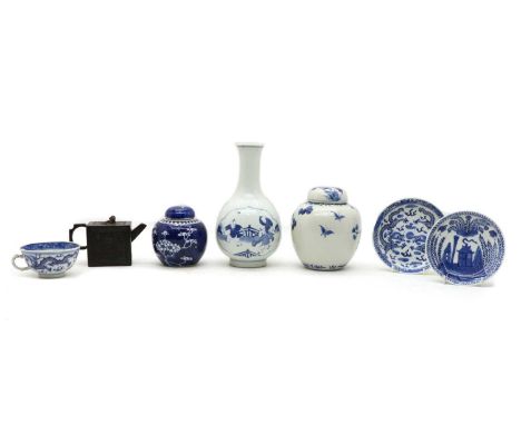 A collection of Chinese blue and white, comprising: a ginger jar and cover, of ovoid form, painted with birds and chrysanthem