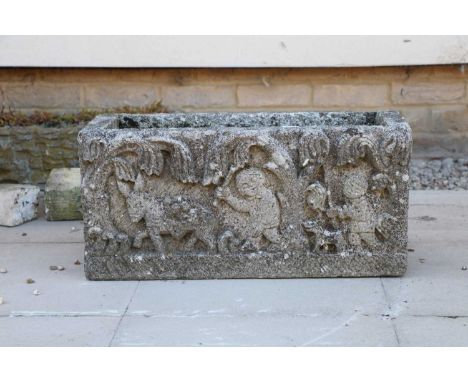 A Haddonstone style rectangular trough, with relief decoration, 60cm wide, 30cm deep, 38cm highCondition report: Weathered fi