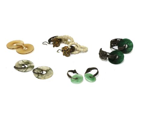 Four pairs of Chinese bi disks, Qing dynasty (1644-1911), in jade, hardstone, or agate, 1.9 to 3.1cm diameter, and a pair of 