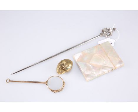 A silver-plated meat skewer; a mother-of-pearl card case; a brass shell-pattern snuff box; and a lorgnette. (4)