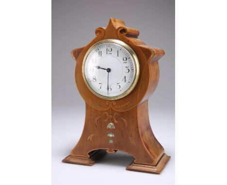 An Edwardian inlaid mahogany mantel clock, in the Art Nouveau taste, inlaid with mother-of-pearl bellflowers and ribbon, the 