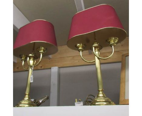 A pair of double light table lamps with shades.
