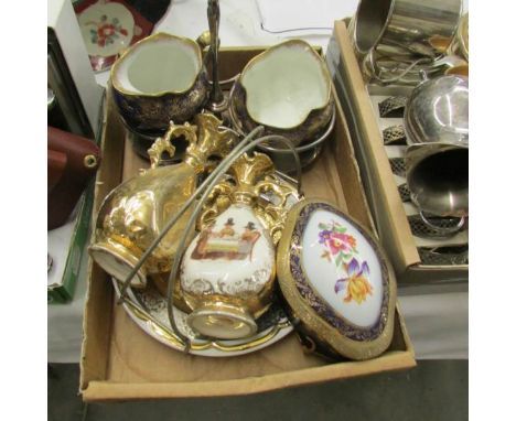 A tray of interesting ceramic items.