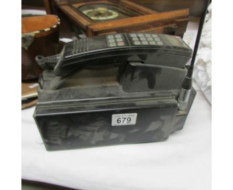A vintage Motorolla 'Brick' telephone.