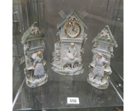 A 3 piece bisque porcelain clock garniture.