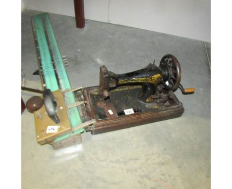 A Singer sewing machine and a vintage knitting machine.