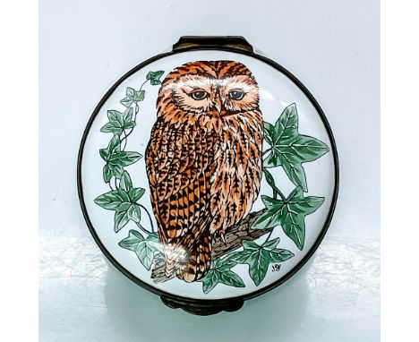 A lovely, enameled box with a white top and a green base, featuring a picture of a wise owl on the lid. Hinged metal trimmed 