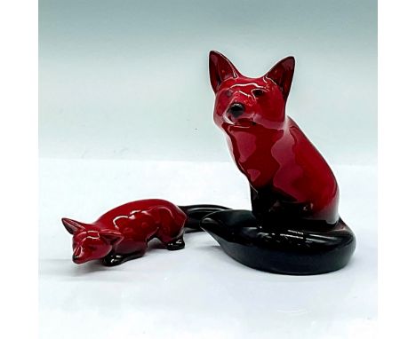 Pair of Royal Doulton Flambe Figurines, Foxes HN147A-1 and HN147B. A pair of fox figures that have a deep red and black color