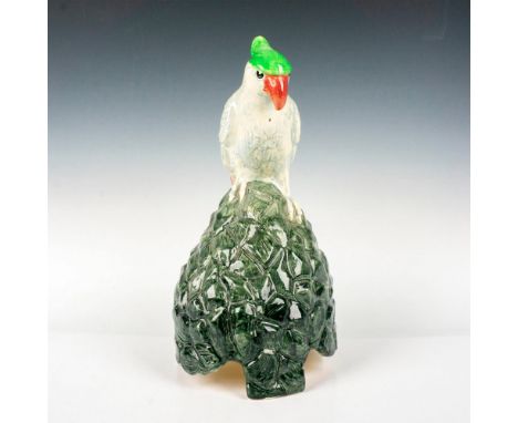 Art deco pottery cover made for Artandia Limited. Stands raised on a three square feet and is of beehive shape with a large c