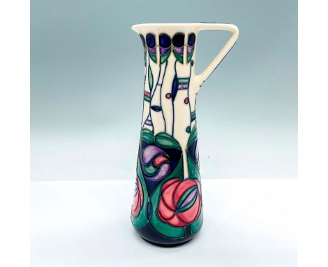 Attributed to Charles Rennie Mackintosh (Scottish 1868-1928) stained glass roses. White and dark navy ground jug adorned in A