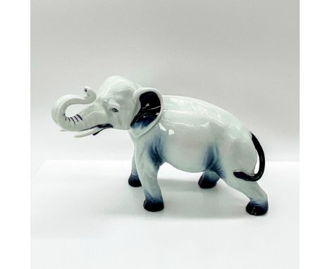 Rare color variation done in a high fired blue flambe glaze. Small size, trunk in salute. Royal Doulton backstamp. Artist: Ch