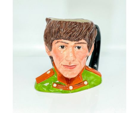 Green tunic; orange collar and epaulettes. George Harrison (1943 - 2001) played guitar and wrote songs for the Beatles. Upon 