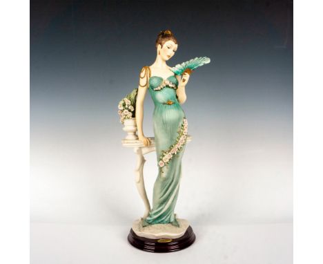 Elegant figurine of pretty lady in teal dress holding a fan, model # 388/C Soiree. Giuseppe Armani embossed to base. 1995 Flo