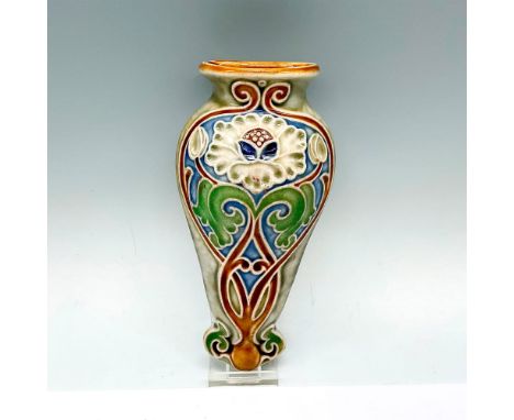 Art Nouveau wall hanging vase adorned with a stylized flower. Royal Doulton impressed stamp. Artist monogram on the back. Art