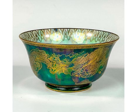 Decorated exterior with oriental dragons over a green mottling underglaze. Mother of pearl lustre interior with the Pan-Fei b