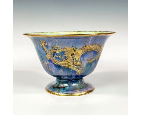 Decorated exterior with the Celestial Dragon and Sacred Pearl pattern over a blue mottling underglaze. Mother of pearl lustre