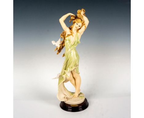 Limited edition a lady in a soft green gown, surrounded by dove birds. Giuseppe Armani signature on porcelain. Official Arman
