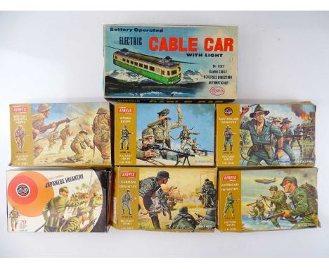 A group of AIRFIX 1:32 scale military figure packs together with a COSMO battery operated cable car - G in F/G boxes (7)