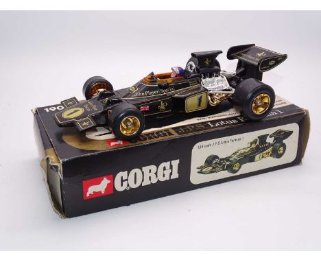 A CORGI Toys 190 1:18 Scale 'John Player Special' Lotus Formula One Car - G/VG in Generally G box complete with wheel removal