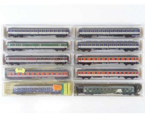 A group of mainly German Outline N Gauge passenger coaches by FLEISCHMANN, MINITRIX and others - mostly in DB Popwagen Livery