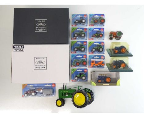 A group of diecast tractor models to include a UNIVERSAL HOBBIES 1:16 scale Fordson E27N 70th Anniversary limited edition exa