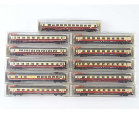 A group of N Gauge German Outline passenger coaches by FLEISCHMANN all in TEE red/cream livery - VG in G boxes (11)