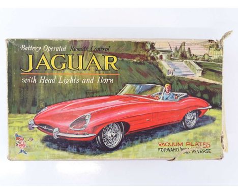 A LOUIS MARX battery operated remote control Jaguar E-Type - G/VG in F/G box