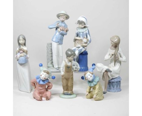 A collection of seven Nao figures, to include a pair of kneeling clowns, tallest 25cm (7)