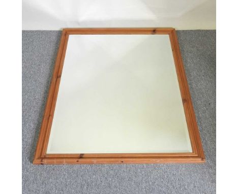 A large modern pine framed mirror, 134 x 103cmOverall condition is complete. Glass is intact. Dirty, but really just needs a 