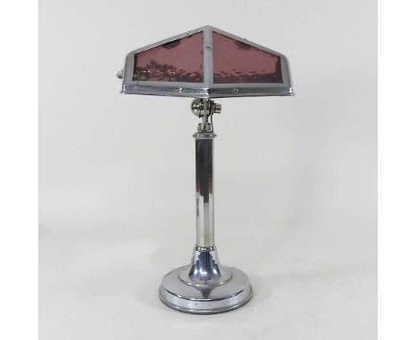 An Art Deco chrome adjustable desk lamp, with coloured glass panels, 44cm high