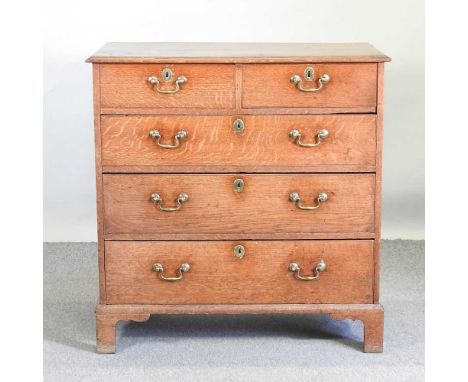 A George III light oak chest, containing two short over three long drawers, on bracket feet96w x 53d x 98h cm