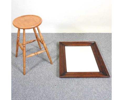 A modern oak framed wall mirror, of rectangular shape, by Titchmarsh &amp; Goodwin, 80 x 65cm, together with a modern light e