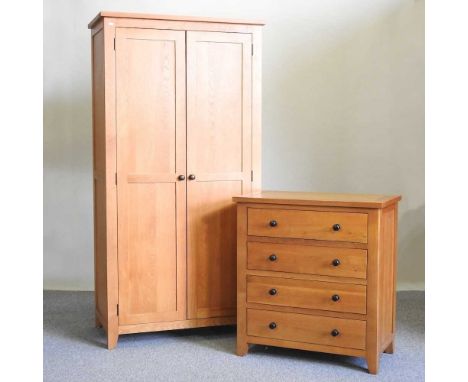 A modern light oak double wardrobe, together with a matching chest of drawers and a coffee table (3)wardrobe 97w x 55d x 190h