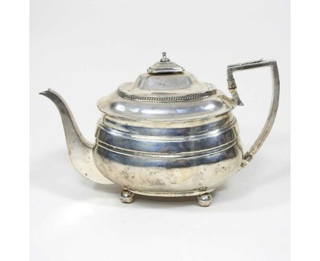 A George III silver teapot, of oval shape, London 1811, 462g, 25cm long. Note: a non-transferable ivory exemption certificate