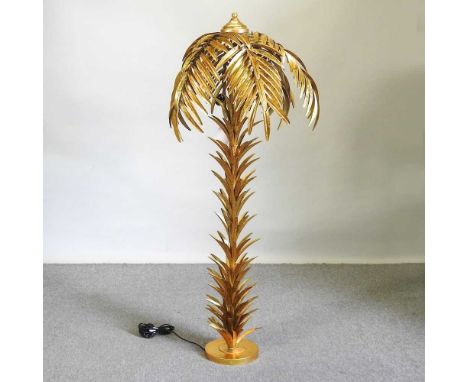 A gilt metal standard lamp, in the form of a palm tree, 159cm highThis is new and does not appear to have been used, but made