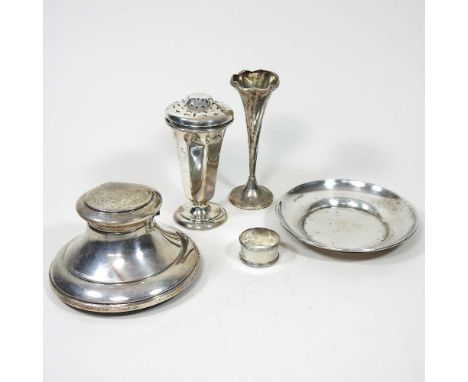 An early 20th century silver capstan inkwell, 12cm wide, together with a silver dish, 61g, a silver pot pourri vase, 127g, a 