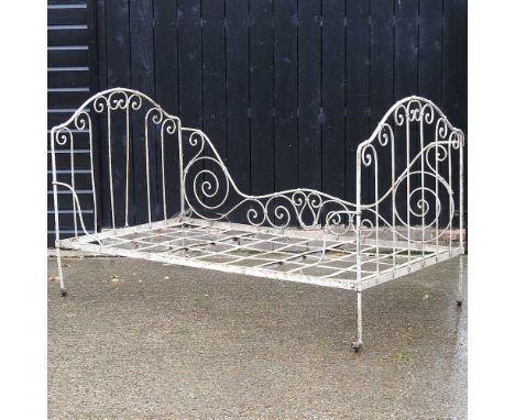 A French white painted iron daybed, on casters 188w x 108d x 112h cm