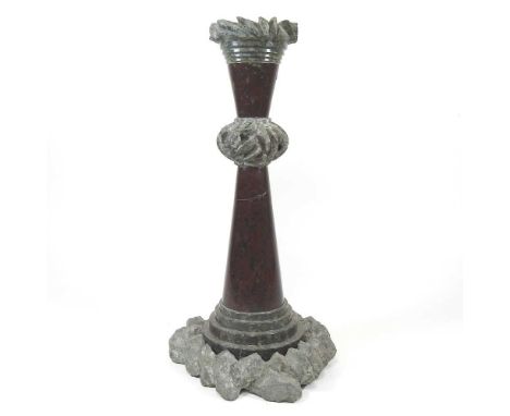 An early 20th century marble lamp, in the form of a lighthouse, on a rocky base, 38cm highGenerally dirty, but solid and usab