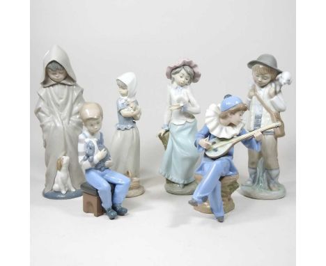A collection of six Nao figures, to include a boy with a dog, 27cm high (6)