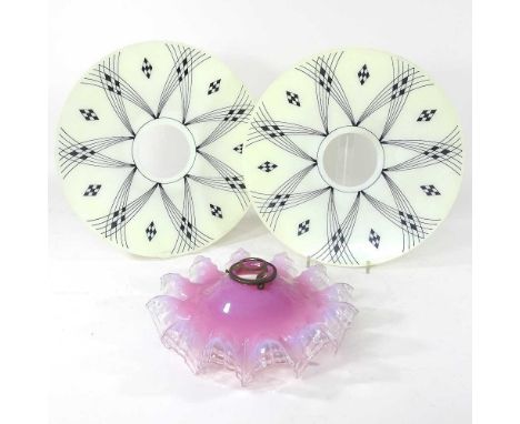 A frilled pink glass light shade, 27cm diameter, together with a pair of 1950's style glass shades (3)