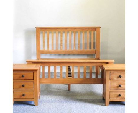 A modern light oak double bedstead, with a slatted base, together with a pair of similar bedside chests (3)148w x 210d x 110h